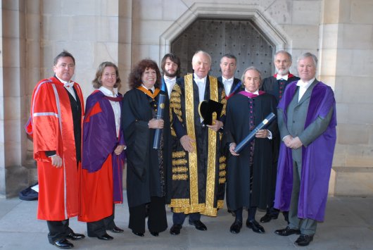 Dr Claire Whitehead, Chancellor Sir Menzies Campbell and Principal and Vice-Chancellor Dr Brian Lang with the honorary graduates and their laureators. Credit: Ede & Ravenscroft.